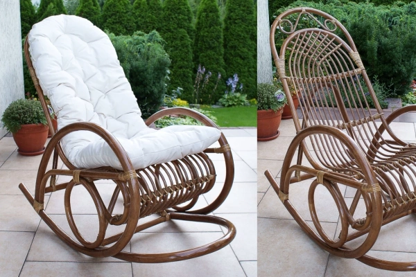 Rattanowy fotel bujany z białą poduszką